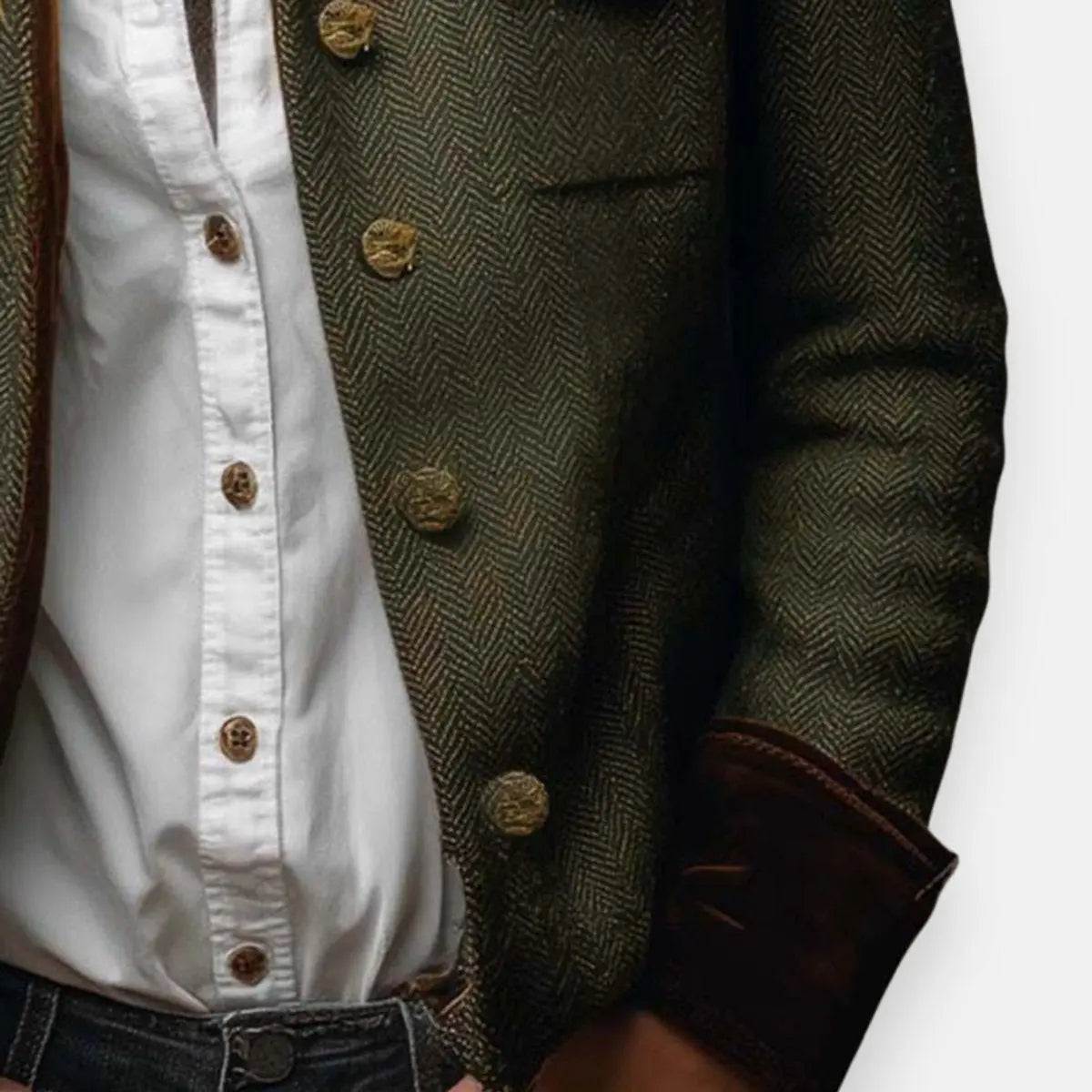 Close-up of gold-tone buttons and velvet cuff on the army green jacket