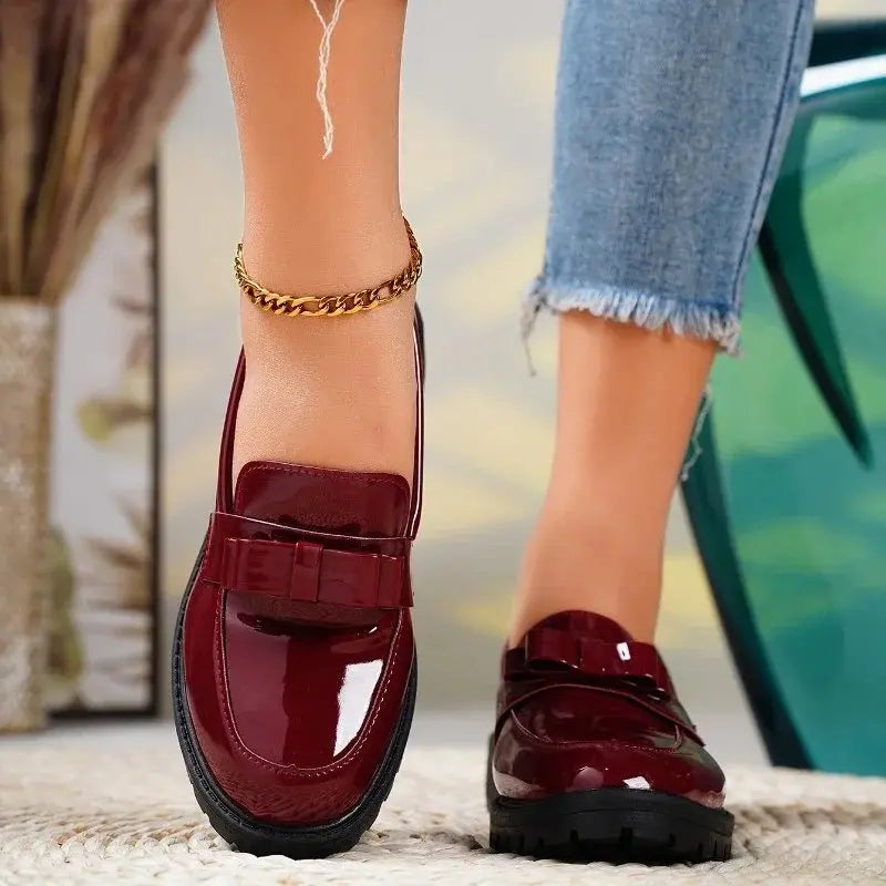Patent bow loafers in Burgundy, front view
