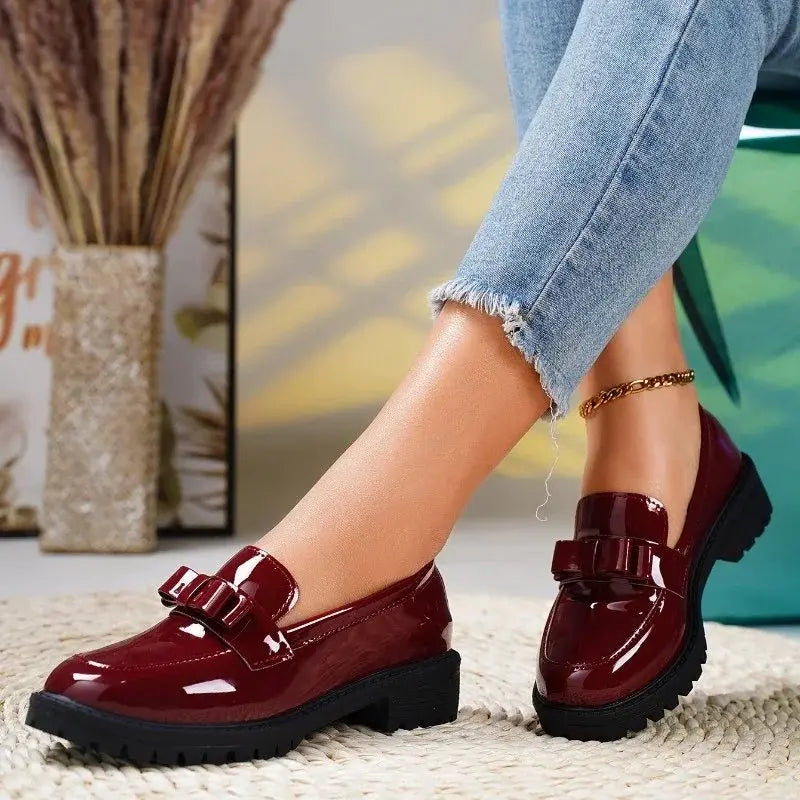Patent bow loafers in Burgundy, side view