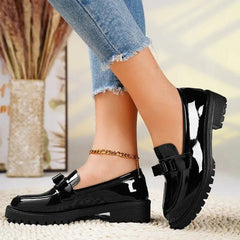 Patent bow loafers in Black with chunky lug sole